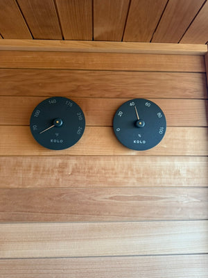 Searsmont, Maine custom sauna — black thermometer and hygrometer on the thermo-aspen wall