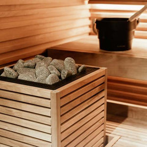 HUUM CORE thermo-aspen sauna heater installed in a sauna